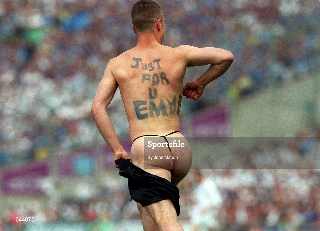 30 July 2000; A streaker, Brian Togher, runs onto the pitch during the Bank of Ireland Leinster Senior Football Championship Final between Dublin and Kildare at Croke Park in Dublin. Photo by John Mahon/Sportsfile