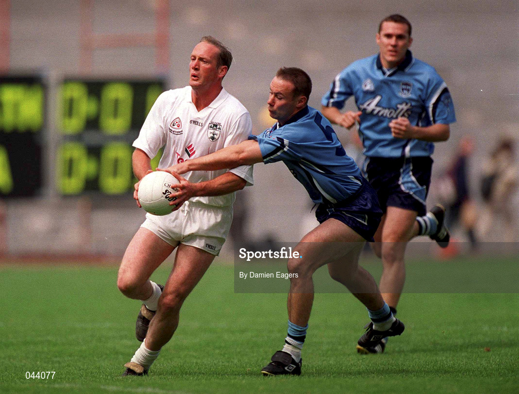 30 July 2000; Willie McCreery of Kildare is tackled by Paul Curran of Dublin during the Bank of Ireland Leinster Senior Football Championship Final between Dublin and Kildare at Croke Park in Dublin. Photo by Damien Eagers/Sportsfile