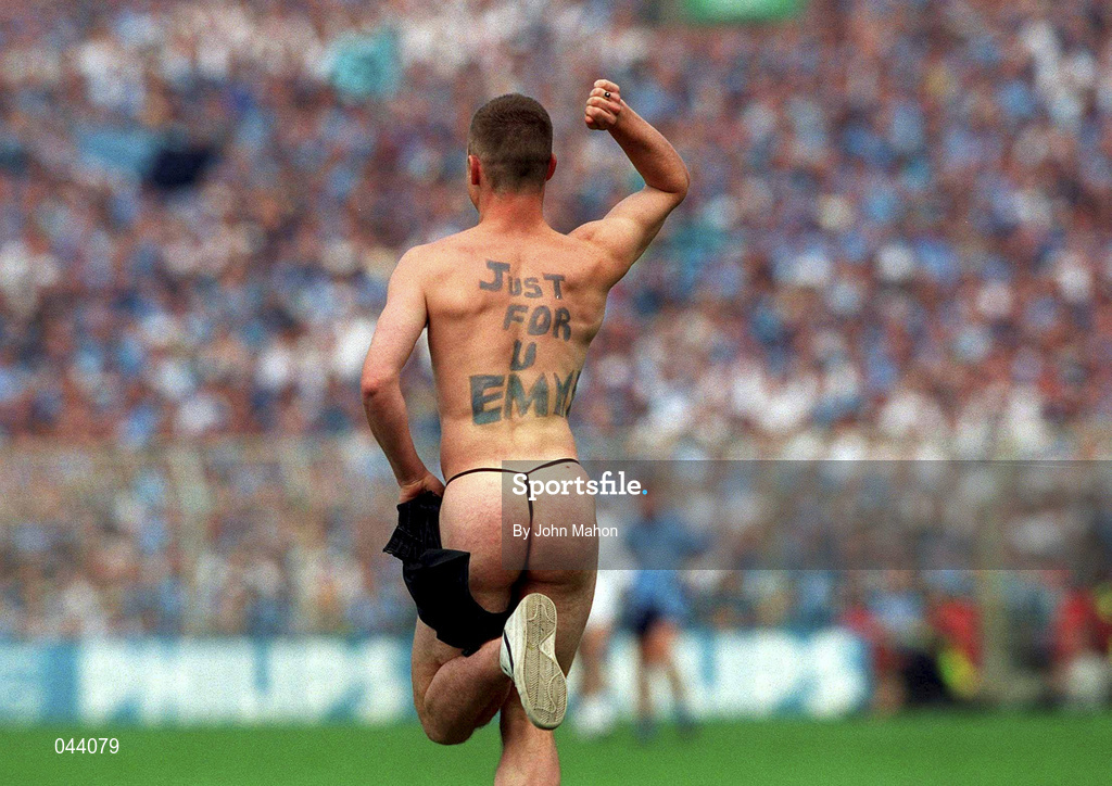 30 July 2000; A streaker, Brian Togher, runs onto the pitch during the Bank of Ireland Leinster Senior Football Championship Final between Dublin and Kildare at Croke Park in Dublin. Photo by John Mahon/Sportsfile