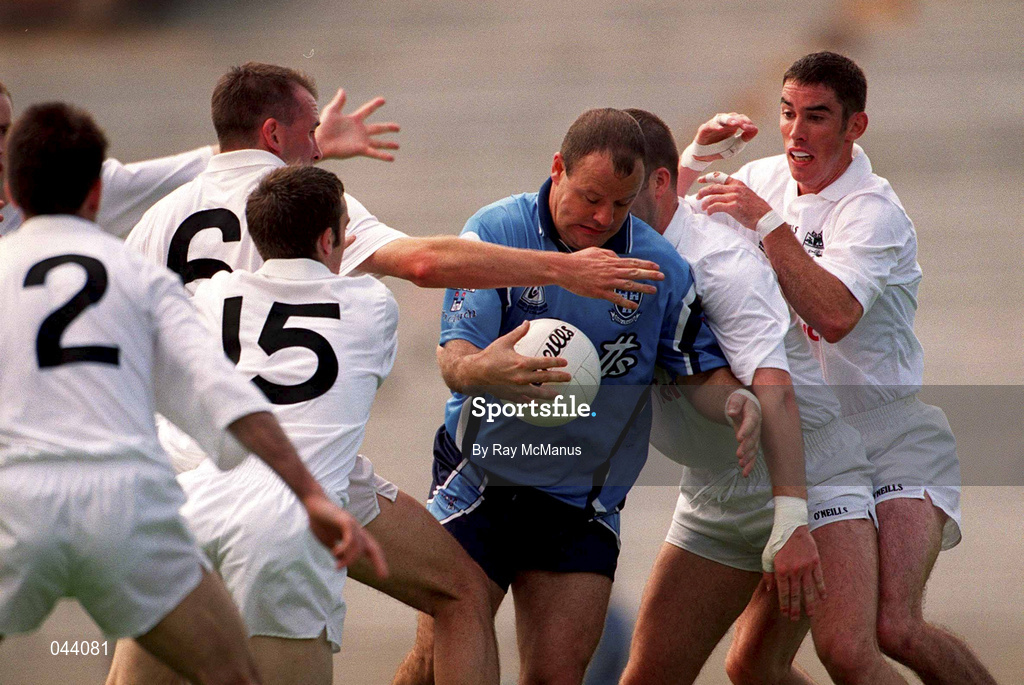 30 July 2000; Vinnie Murphy of Dublin under pressure from Kildare's Ken Doyle, 2, Glenn Ryan, 6, Tadhg Fennin, 15, Ronan Quinn and Anthony Rainbow, right, during the Bank of Ireland Leinster Senior Football Championship Final between Dublin and Kildare at Croke Park in Dublin. Photo by Ray McManus/Sportsfile