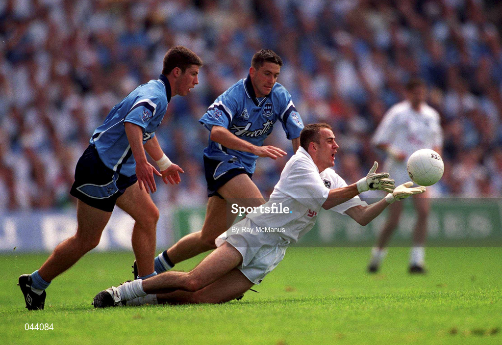 30 July 2000; Kidare's Brian Lacey catches the ball despite the pressure from Colin Moran, left, and Senan Connell of Dublin during the Bank of Ireland Leinster Senior Football Championship Final between Dublin and Kildare at Croke Park in Dublin. Photo by Ray McManus/Sportsfile