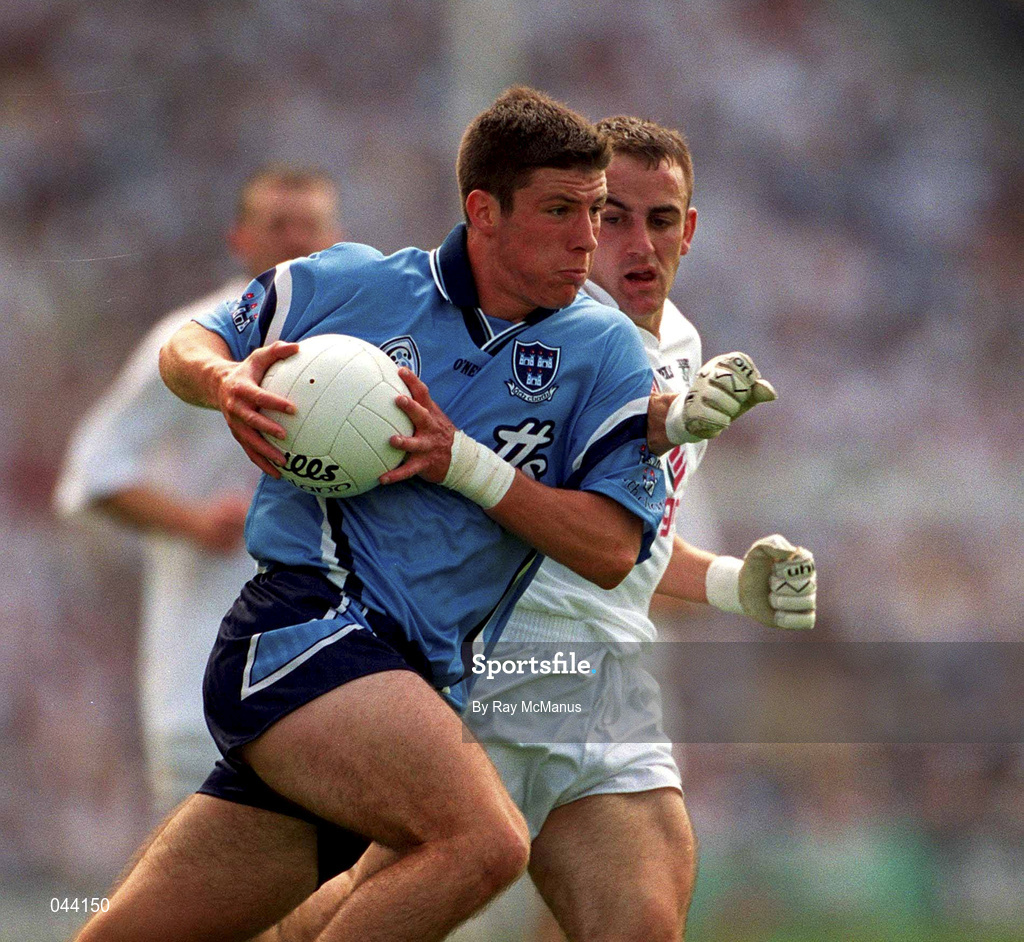 30 July 2000; Colin Moran of Dublin is tackled by Brian Lacey of Kildare during the Bank of Ireland Leinster Senior Football Championship Final between Dublin and Kildare at Croke Park in Dublin. Photo by Ray McManus/Sportsfile
