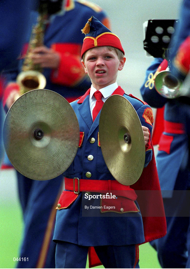 30 July 2000; 11-year-old Aaron Dunne preforms with The Artane Boys Band during the pre-match parade ahead of the Bank of Ireland Leinster Senior Football Championship Final between Dublin and Kildare at Croke Park in Dublin. Photo by Damien Eagers/Sportsfile