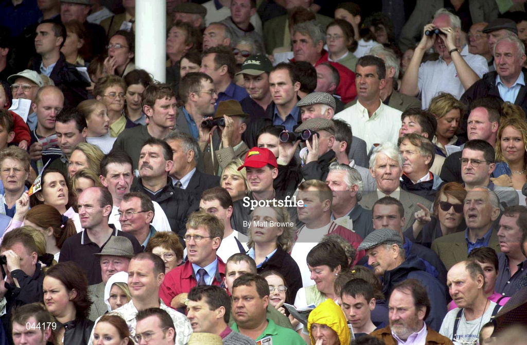 31 July 2000; Racegoers watch on during the opening day of the Galway Racing Festival at Galway Racecourse in Ballybrit, Galway. Photo by Matt Browne/Sportsfile