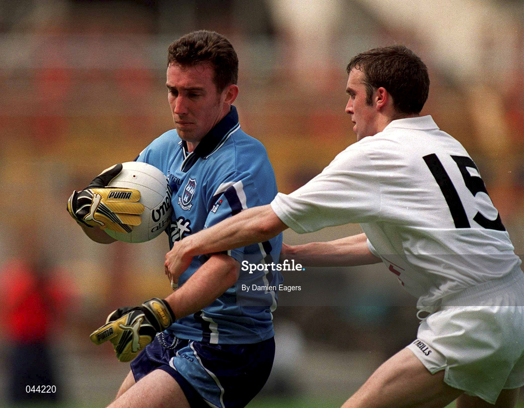 30 July 2000; Paddy Christie of Dublin is tackled by Tadhg Fennin of Kildare during the Bank of Ireland Leinster Senior Football Championship Final between Dublin and Kildare at Croke Park in Dublin. Photo by Damien Eagers/Sportsfile
