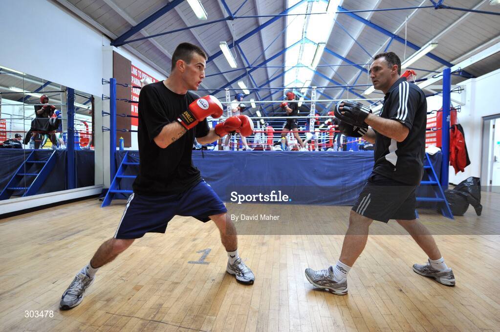 10 June 2008; Ireland's Olympic boxer John Joe Joyce sparring with head coach Billy Walsh during a photocall. Olympic Boxers photocall, National Stadium, Dublin. Picture credit: David Maher / SPORTSFILE *** Local Caption *** S0806060 Olympic Boxers photocall