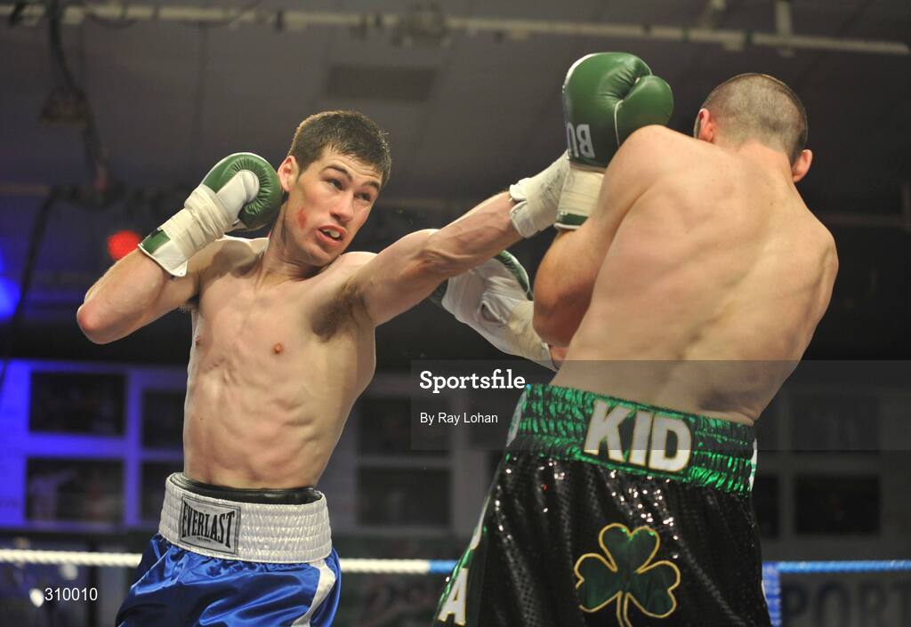 12 July 2008; Andrew Murray, left, lands a punch on Peter McDonagh. Irish Lightweight Championship, Hunky Dory Fight Night, Irish Lighweight Championship, National Stadium, Dublin. Picture credit: Ray Lohan / SPORTSFILE *** Local Caption ***