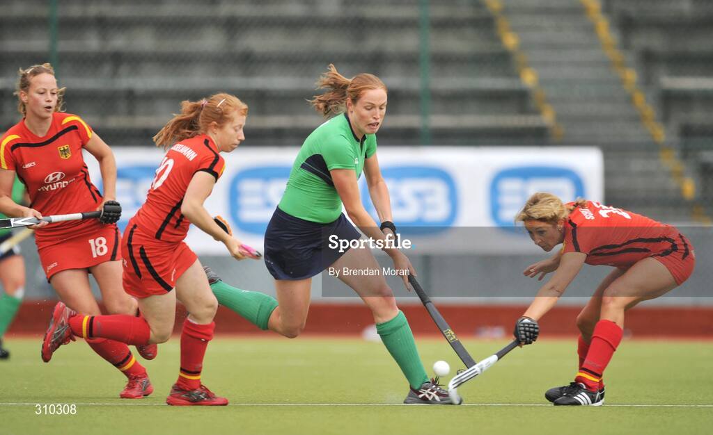 12 June 2008; Roisin Flinn, Ireland, in action against Nina Hasselmann, left, and Christina Schutze, Germany. Setanta Sports Trophy, Ireland v Germany, National Hockey Stadium, UCD, Belfield, Dublin. Picture credit: Brendan Moran / SPORTSFILE