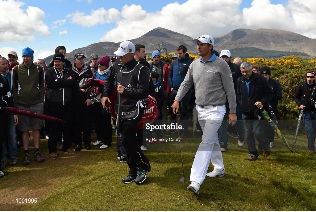 29 May 2015; Padraig Harrington, Ireland, walks through the crowd after playing a shot from the rough on the 3rd hole. Dubai Duty Free Irish Open Golf Championship 2015, Day 2. Royal County Down Golf Club, Co. Down. Picture credit: Ramsey Cardy / SPORTSFILE