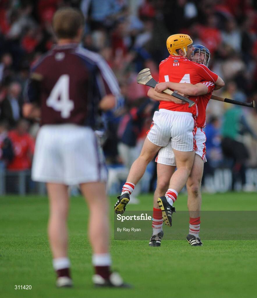 19 July 2008; Joe Deane, Cork, celebrates as Ollie Canning, Galway looks on. GAA Hurling All-Ireland Senior Championship Qualifier - Round 4, Cork v Galway, Thurles, Co. Tipperary. Picture credit: Ray Ryan / SPORTSFILE