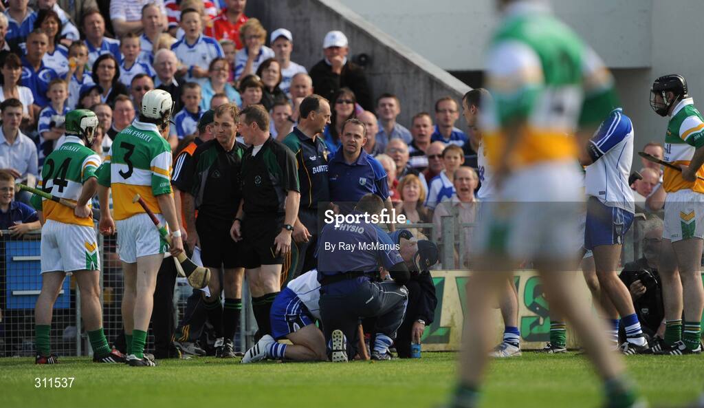 19 July 2008; The Offaly and Waterford managers Joe Dooley, left, and Davy Fitzgerald stand shoulder to shoulder as a Waterford player is attended to in the second-half. GAA Hurling All-Ireland Senior Championship Qualifier - Round 4, Offaly v Waterford, Thurles, Co. Tipperary. Picture credit: Ray McManus / SPORTSFILE