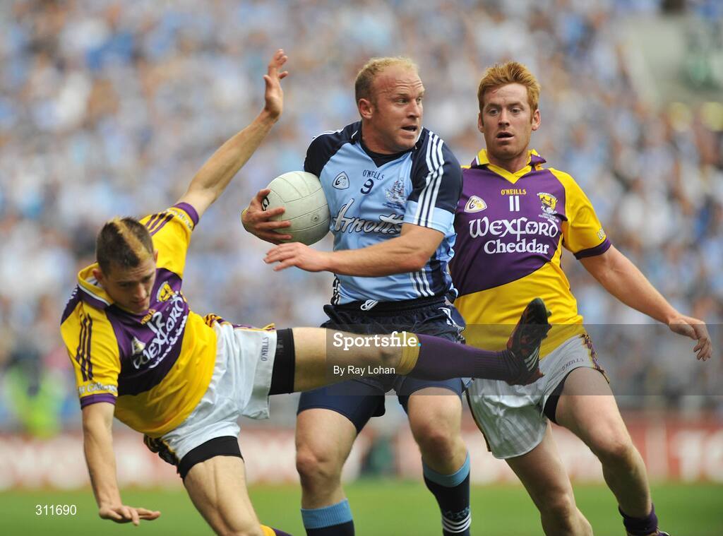 20 July 2008; Shane Ruan, Dublin, in action against Adrian Flynn, left and Eric Bradley, Wexford. GAA Football Leinster Senior Championship Final, Dublin v Wexford, Croke Park, Dublin. Picture credit: Ray Lohan / SPORTSFILE *** Local Caption ***
