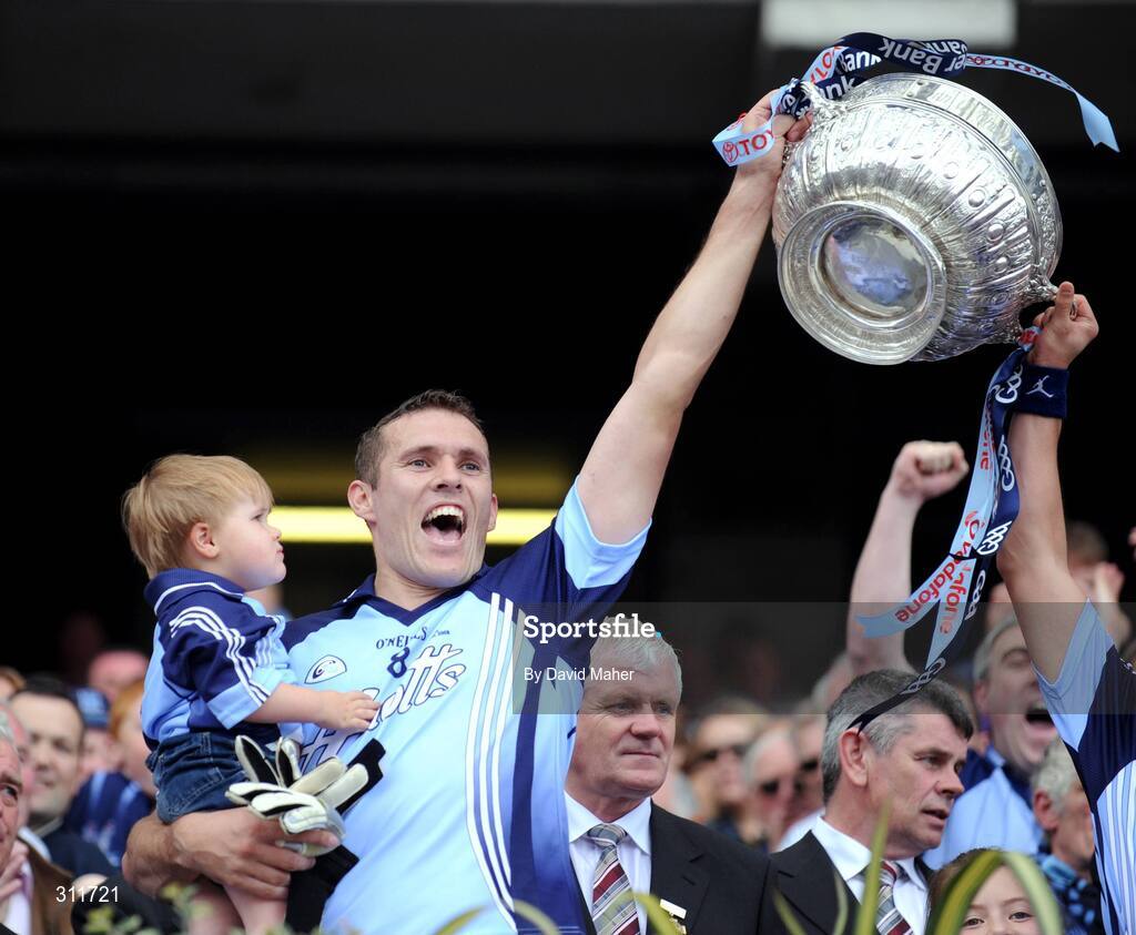 20 July 2008; Ciaran Whelan, Dublin, celebrates with his son Jamie at the end of the game. GAA Football Leinster Senior Championship Final, Dublin v Wexford, Croke Park, Dublin. Picture credit: David Maher / SPORTSFILE