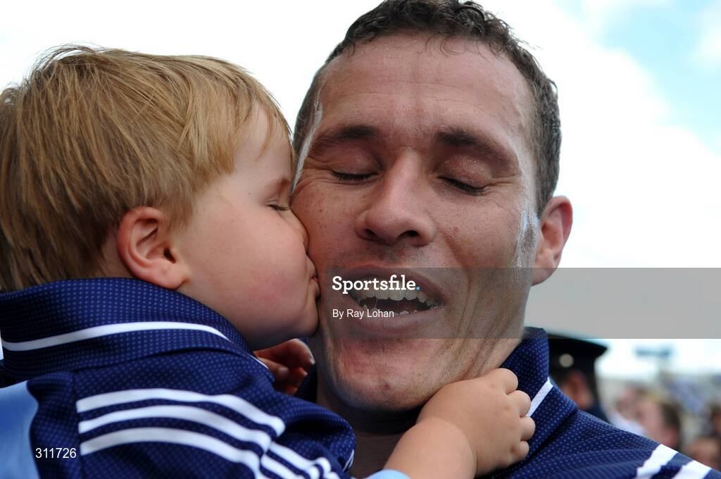 20 July 2008; Dublin's Ciaran Whelan gets a kiss from his son Jamie after the final whistle. GAA Football Leinster Senior Championship Final, Dublin v Wexford, Croke Park, Dublin. Picture credit: Ray Lohan / SPORTSFILE *** Local Caption ***