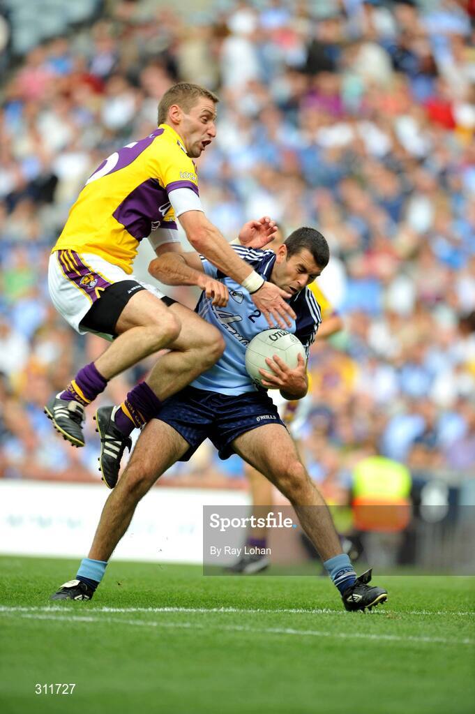 20 July 2008: David Henry, Dublin, in action against Matty Forde, Wexford. GAA Football Leinster Senior Championship Final, Dublin v Wexford, Croke Park, Dublin. Picture credit: Ray Lohan / SPORTSFILE *** Local Caption ***