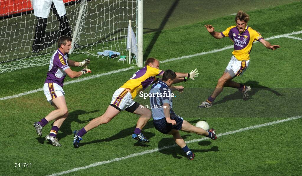 20 July 2008; Diarmuid Connolly beats Wexford players Anthony Masterson, Philip Wallace and Brian Malone, right, to score Dublin's first goal. GAA Football Leinster Senior Championship Final, Dublin v Wexford, Croke Park, Dublin. Picture credit: Ray McManus / SPORTSFILE