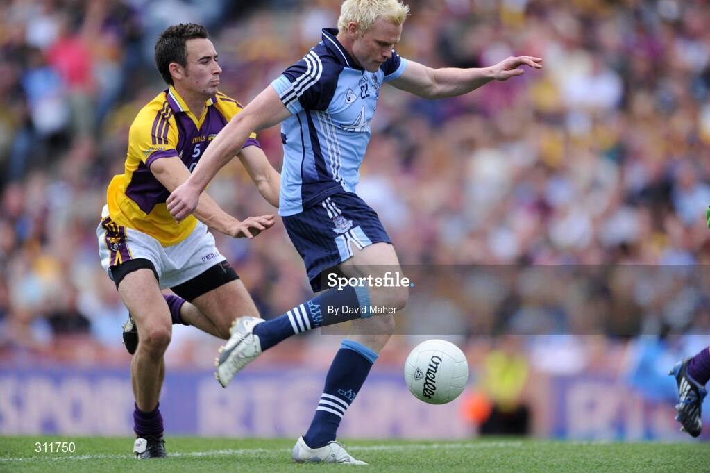 20 July 2008; Mark Vaughan, Dublin, beats Adrian Morrissey, Wexford, to score his side's third goal. GAA Football Leinster Senior Championship Final, Dublin v Wexford, Croke Park, Dublin. Picture credit: David Maher / SPORTSFILE