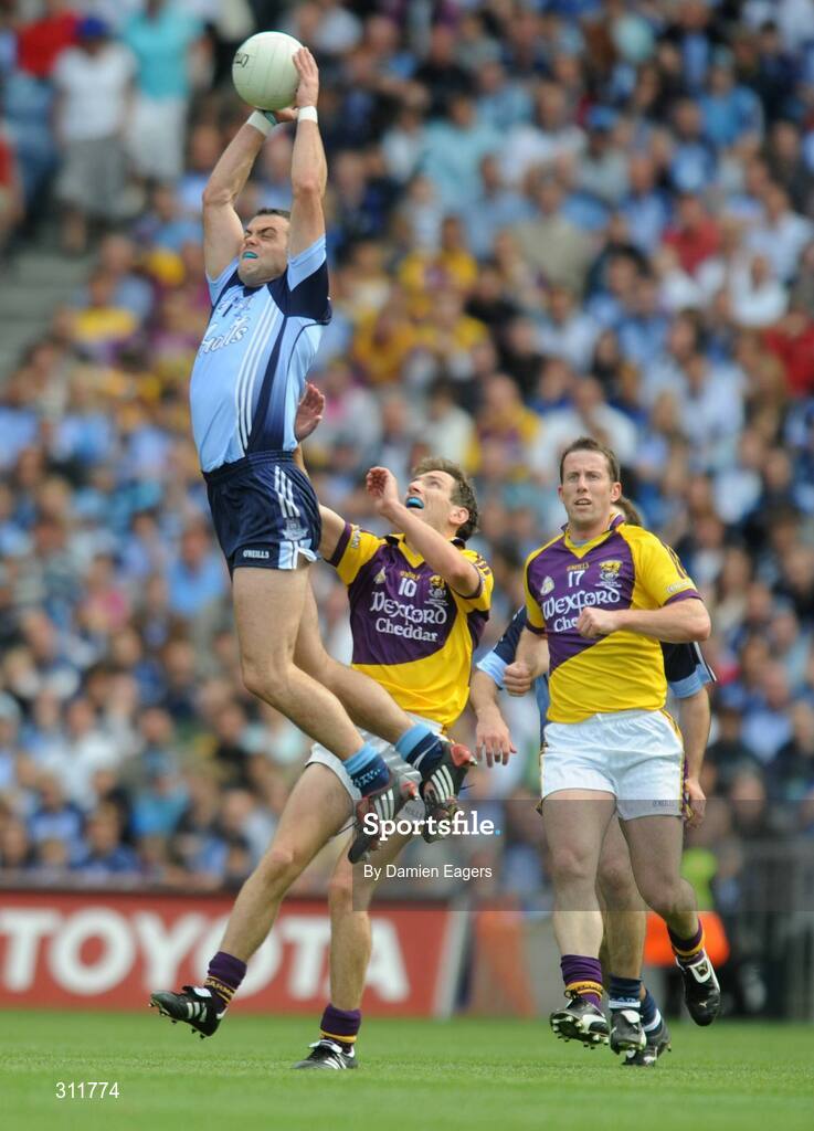 20 July 2008; Paul Casey, Dublin, claims the ball ahead of Wexford's Redmond Barry. GAA Football Leinster Senior Championship Final, Dublin v Wexford, Croke Park, Dublin. Picture credit: Damien Eagers / SPORTSFILE