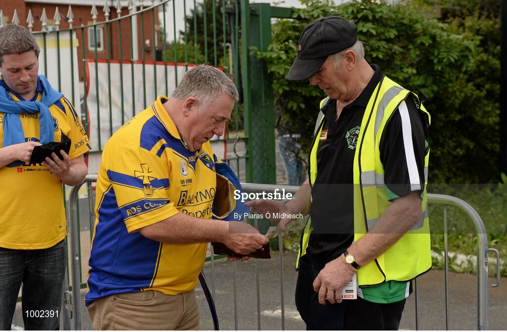 24 May 2015; Roscommon supporter Willie Tiernan, from Boyle, buys a match ticket from steward Stephen O'Malley, originally from Connemara, Galway. Connacht GAA Football Senior Championship Quarter-Final, London v Roscommon. Páirc Smárgaid, Ruislip, London, England. Picture credit: Piaras Ó Mídheach / SPORTSFILE