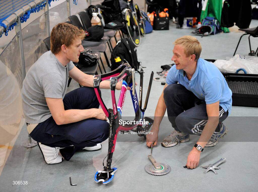 23 June 2008; Irish Olympic cyclist David O'Loughlin sets up his bike with team-mate Martyn Irvine. Wales National Velodrome, Newport, Wales. Picture credit: Stephen McCarthy / SPORTSFILE