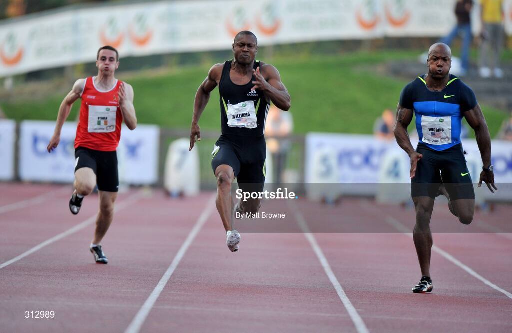 25 July 2008; Bernard Williams, USA, centre, on the way to winning the men's 100m from Ernest Wiggins, USA, right, and Davis O'Shea, Ireland. Morton Memorial Games, Morton Stadium, Santry, Co. Dublin Picture credit: Matt Browne / SPORTSFILE