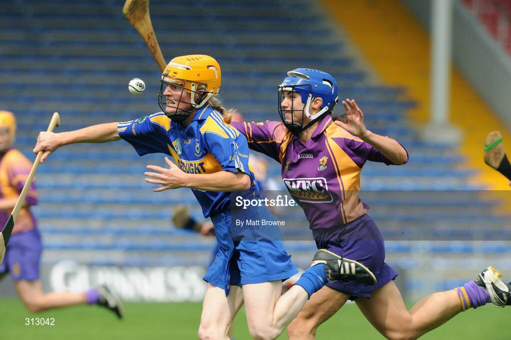 26 July 2008; Joanne Ryan, Tipperary, in action against Aoife O'Connor, Wexford. Gala All-Ireland Senior Camogie Championship, Tipperary v Wexford, Semple Stadium, Thurles, Co. Tipperary. Picture credit: Matt Browne / SPORTSFILE