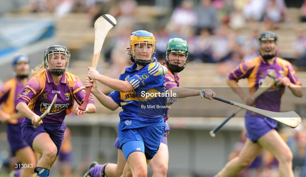 26 July 2008; Mairead Morrissey, Tipperary, in action against Bernie Holohan, left, and Catherine O'Loughlin, Wexford. Gala All-Ireland Senior Camogie Championship, Tipperary v Wexford, Semple Stadium, Thurles, Co. Tipperary. Picture credit: Matt Browne / SPORTSFILE