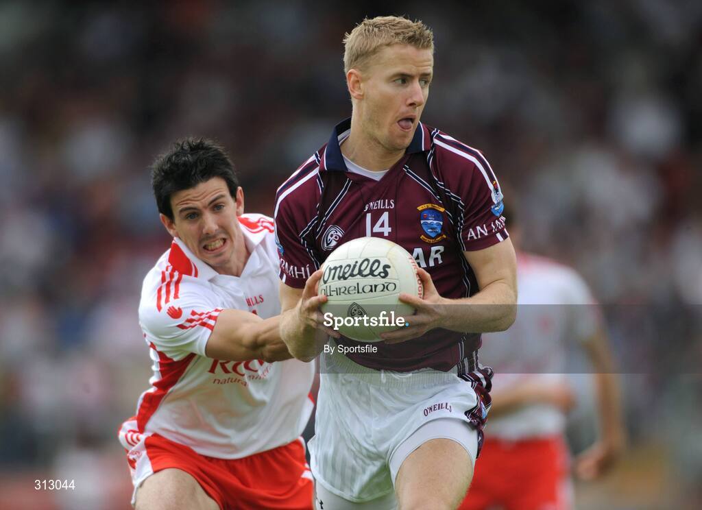 26 July 2008; Denis Glennon, Westmeath, in action against P.J. Quinn, Tyrone. GAA Football All-Ireland Senior Championship Qualifier, Round 2, Tyrone v Westmeath, Healy Park, Omagh, Co. Tyrone. Photo by Sportsfile
