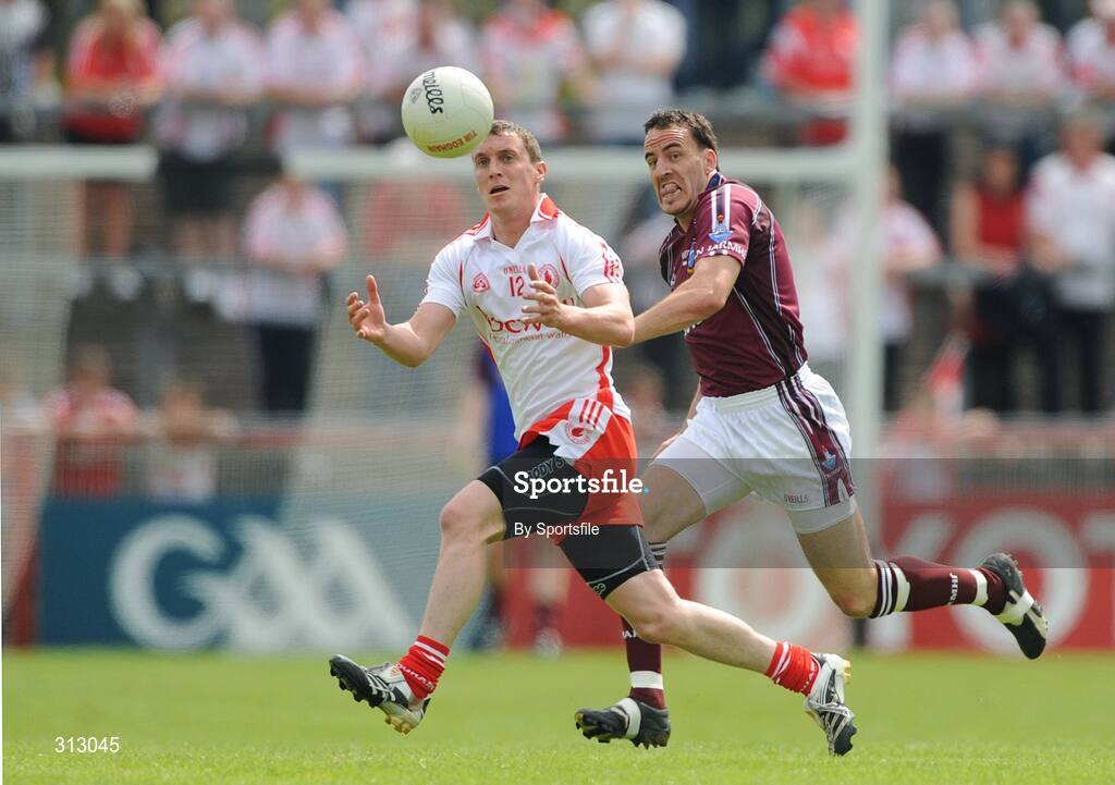 26 July 2008; Tommy McGuigan, Tyrone, in action against Damien Healy, Westmeath. GAA Football All-Ireland Senior Championship Qualifier, Round 2, Tyrone v Westmeath, Healy Park, Omagh, Co. Tyrone. Photo by Sportsfile