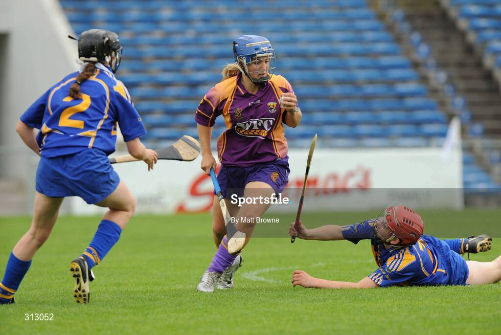 26 July 2008; Katrina Parrock, Wexford, in action against Mairead Luttrell and Suzanne Kelly, left, Tipperary. Gala All-Ireland Senior Camogie Championship, Tipperary v Wexford, Semple Stadium, Thurles, Co. Tipperary. Picture credit: Matt Browne / SPORTSFILE