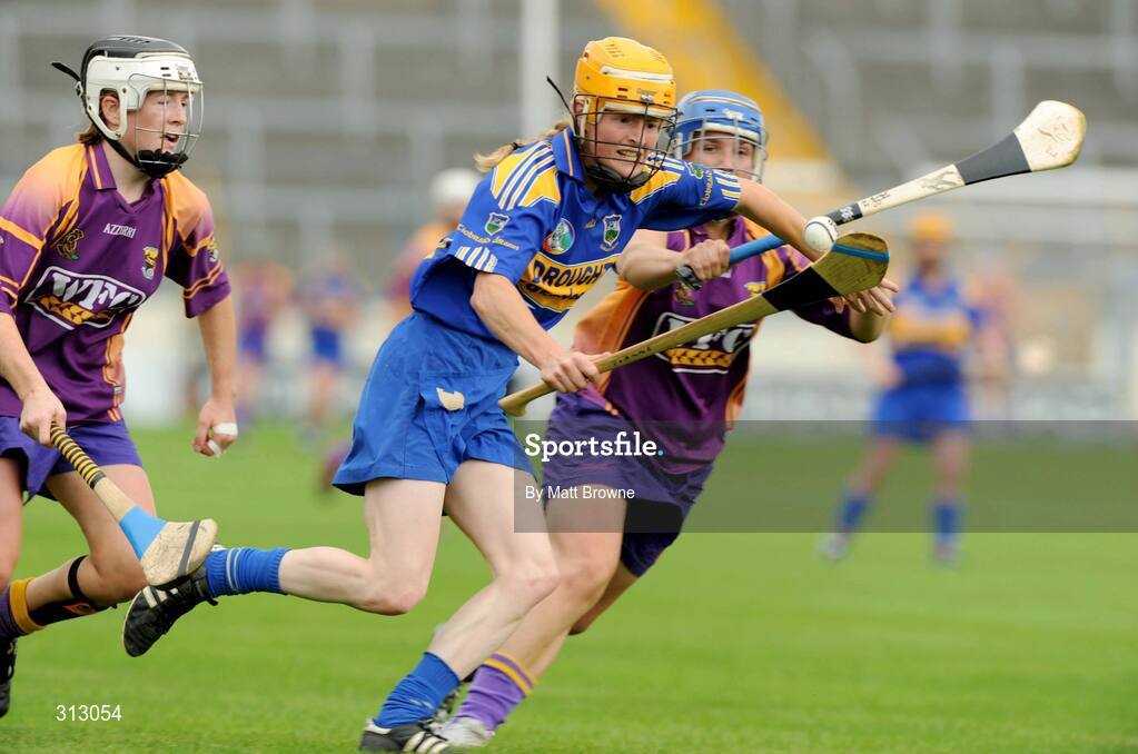 26 July 2008; Joanne Ryan, Tipperary, in action against Katrina Parrock and Kate Kelly, left, Wexford. Gala All-Ireland Senior Camogie Championship, Tipperary v Wexford, Semple Stadium, Thurles, Co. Tipperary. Picture credit: Matt Browne / SPORTSFILE