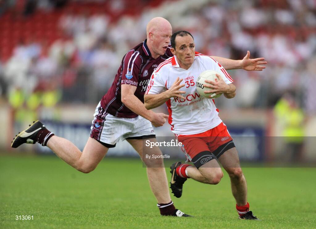 26 July 2008; Brian Dooher, Tyrone, in action against Donal O'Donoghue, Westmeath. GAA Football All-Ireland Senior Championship Qualifier - Round 2, Tyrone v Westmeath, Healy Park, Omagh, Co. Tyrone. Photo by Sportsfile