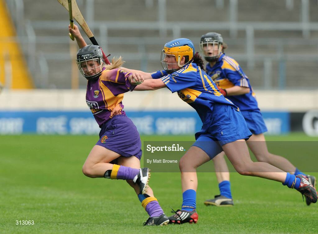 26 July 2008; Bernie Holohan, Wexford, in action against Mairead Morrissey, Tipperary. Gala All-Ireland Senior Camogie Championship, Tipperary v Wexford, Semple Stadium, Thurles, Co. Tipperary. Picture credit: Matt Browne / SPORTSFILE