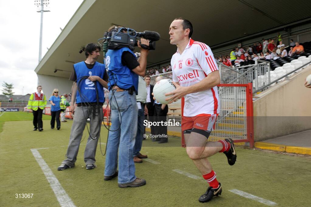 26 July 2008; Tyrone captain Brian Dooher makes his way out onto the pitch for the start of the game. GAA Football All-Ireland Senior Championship Qualifier - Round 2, Tyrone v Westmeath, Healy Park, Omagh, Co. Tyrone. Photo by Sportsfile