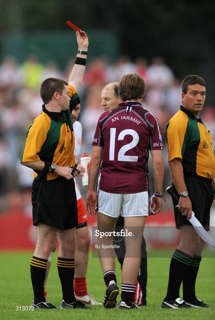 26 July 2008; Doran Harte, Westmeath, is shown the red card by referee Padraig Hughes. GAA Football All-Ireland Senior Championship Qualifier - Round 2, Tyrone v Westmeath, Healy Park, Omagh, Co. Tyrone. Photo by Sportsfile