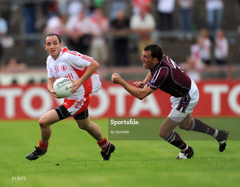26 July 2008; Brian Dooher, Tyrone, in action against Damien Healy, Westmeath. GAA Football All-Ireland Senior Championship Qualifier - Round 2, Tyrone v Westmeath, Healy Park, Omagh, Co. Tyrone. Photo by Sportsfile