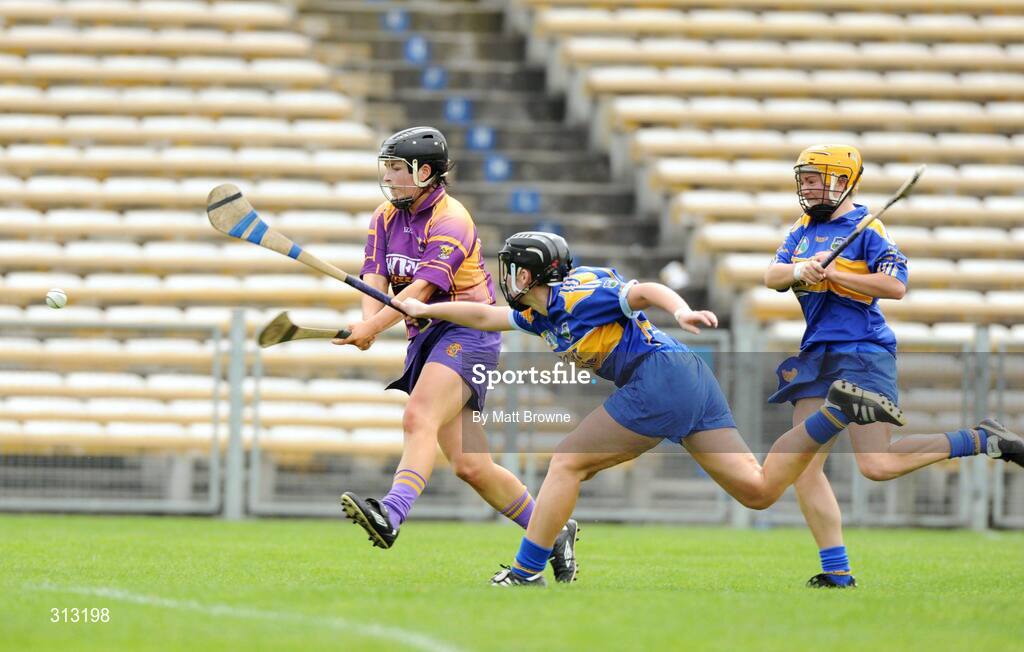 26 July 2008; Ursula Jacob, Wexford, in action against Tishy O'Halloran and Marie Tynan, right, Tipperary. Gala All-Ireland Senior Camogie Championship, Tipperary v Wexford, Semple Stadium, Thurles, Co. Tipperary. Picture credit: Matt Browne / SPORTSFILE