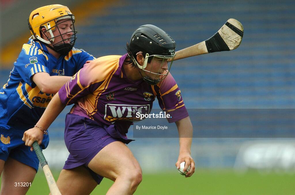26 July 2008; Ursula Jacob, Wexford, in action against Marie Tynan, Tipperary. Gala All-Ireland Senior Camogie Championship, Tipperary v Wexford, Semple Stadium, Thurles, Co. Tipperary. Picture credit: Maurice Doyle / SPORTSFILE