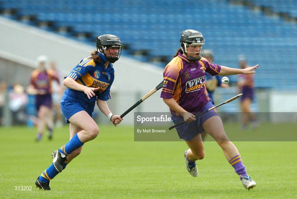 26 July 2008; Una Leacy, Wexford, in action against Suzanne Kelly, Tipperary. Gala All-Ireland Senior Camogie Championship, Tipperary v Wexford, Semple Stadium, Thurles, Co. Tipperary. Picture credit: Maurice Doyle / SPORTSFILE