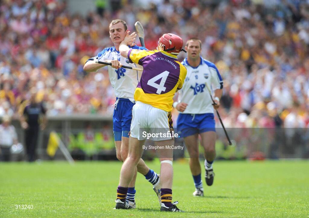 27 July 2008; Eoin Kelly, Waterford, and Paul Roche, Wexford, tussle off the ball. GAA Hurling All-Ireland Senior Championship Quarter-Final, Wexford v Waterford, Semple Stadium, Thurles, Co. Tipperary. Picture credit: Stephen McCarthy / SPORTSFILE
