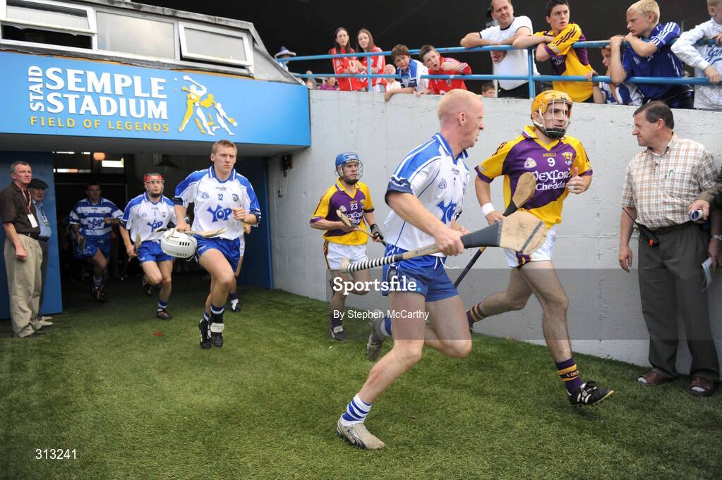 27 July 2008; John Mullane, Waterford, shoulders David Redmond, Wexford, as both teams exit the tunnel at the same time. GAA Hurling All-Ireland Senior Championship Quarter-Final, Wexford v Waterford, Semple Stadium, Thurles, Co. Tipperary. Picture credit: Stephen McCarthy / SPORTSFILE