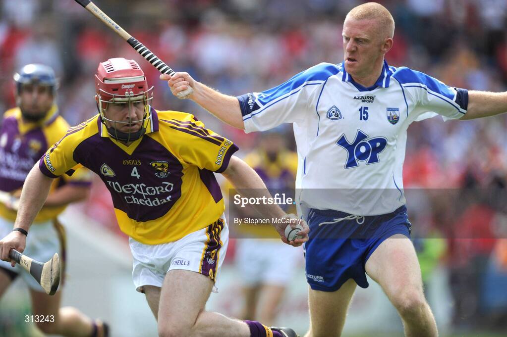 27 July 2008; Paul Roche, Wexford, in action against John Mullane, Waterford. GAA Hurling All-Ireland Senior Championship Quarter-Final, Wexford v Waterford, Semple Stadium, Thurles, Co. Tipperary. Picture credit: Stephen McCarthy / SPORTSFILE