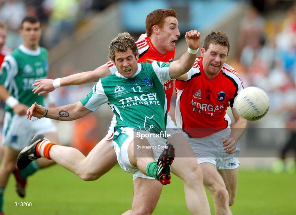 27 July 2008; Ryan Keenan, Fermanagh, in action against Charlie Vernon and Finnian Moriarity, Armagh. GAA Football Ulster Senior Championship Final, Armagh v Fermanagh, St Tighearnach's Park, Clones, Co. Monaghan. Picture credit: Maurice Doyle / SPORTSFILE