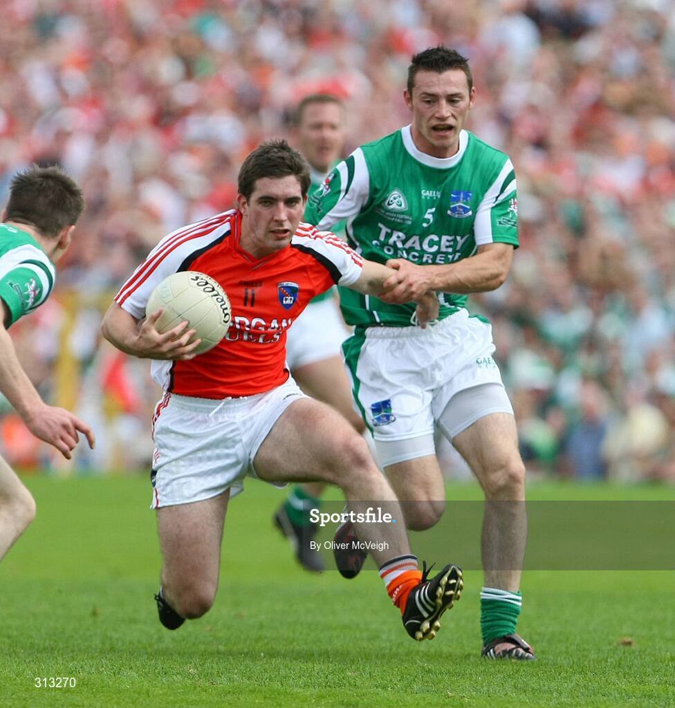 27 July 2008; Brian Mallon, Armagh, in action against Damien Kelly, Fermanagh. GAA Football Ulster Senior Championship Final replay, Armagh v Fermanagh, St Tighearnach's Park, Clones, Co. Monaghan. Picture credit: Oliver McVeigh / SPORTSFILE *** Local Caption *** S0807107 Armagh v Fermanagh OMcV