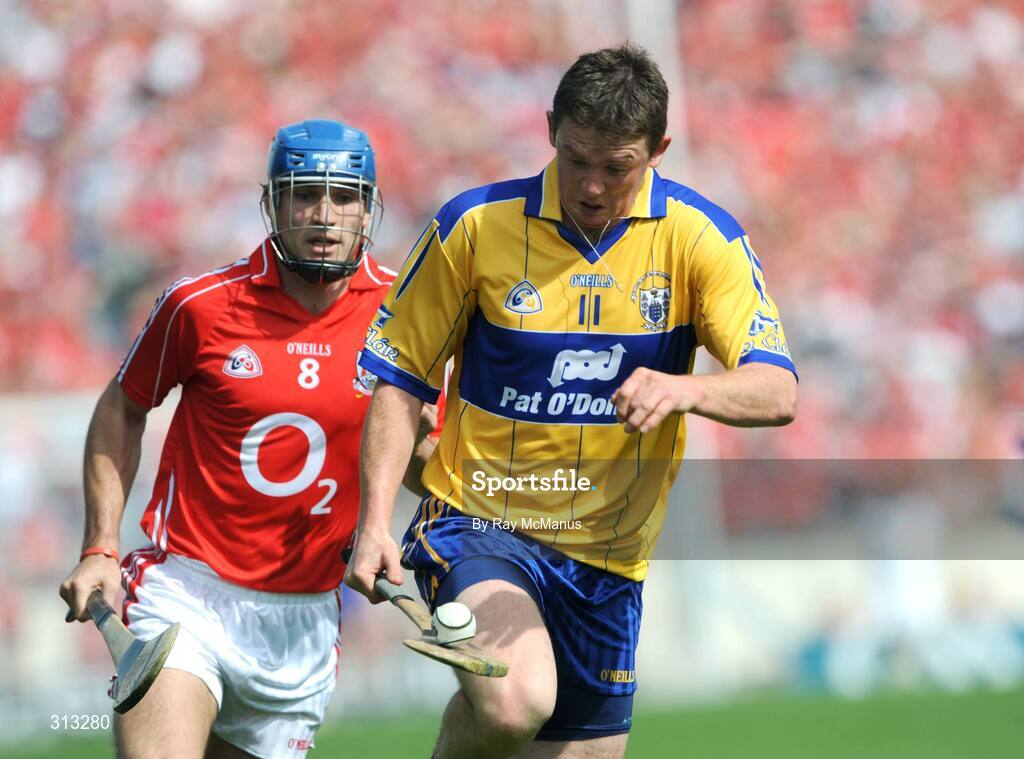 27 July 2008; Diarmuid McMahon, Clare, in action against Tom Kenny, Cork. GAA Hurling All-Ireland Senior Championship Quarter-Final, Clare v Cork, Semple Stadium, Thurles, Co. Tipperary. Picture credit: Ray McManus / SPORTSFILE