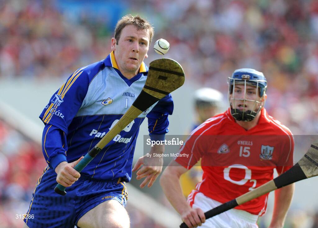 27 July 2008; Philip Brennan, Clare, in action against Patrick Horgan, Cork. GAA Hurling All-Ireland Senior Championship Quarter-Final, Clare v Cork, Semple Stadium, Thurles, Co. Tipperary. Picture credit: Stephen McCarthy / SPORTSFILE