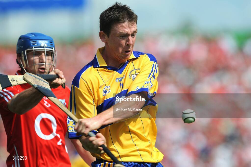 27 July 2008; Diarmuid McMahon, Clare, in action against Tom Kenny, Cork. GAA Hurling All-Ireland Senior Championship Quarter-Final, Clare v Cork, Semple Stadium, Thurles, Co. Tipperary. Picture credit: Ray McManus / SPORTSFILE