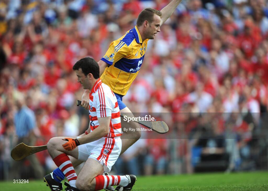 27 July 2008; Clare's Barry Nugent turns past Cork goalkeeper Donal Og Cusack as he celebrates the first goal of the game. GAA Hurling All-Ireland Senior Championship Quarter-Final, Clare v Cork, Semple Stadium, Thurles, Co. Tipperary. Picture credit: Ray McManus / SPORTSFILE