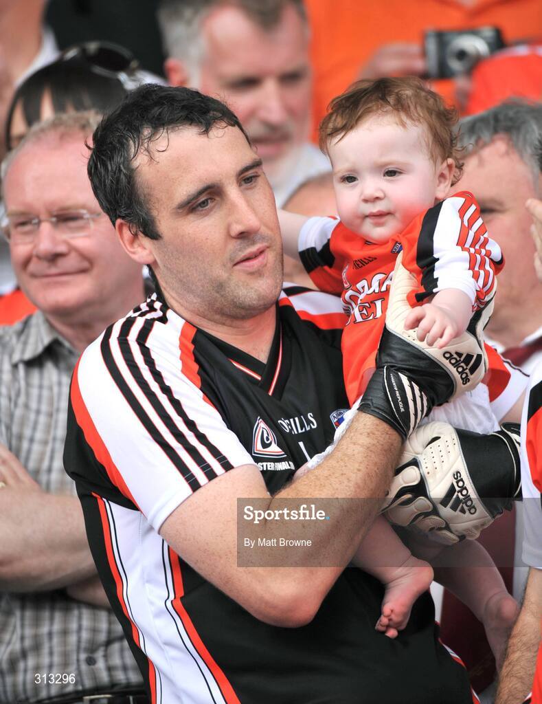 27 July 2008; Armagh goalkeeper Paul Hearty with his ten mounth old daughter Breanne. GAA Football Ulster Senior Championship Final, Armagh v Fermanagh, St Tighearnach's Park, Clones, Co. Monaghan. Picture credit: Matt Browne / SPORTSFILE