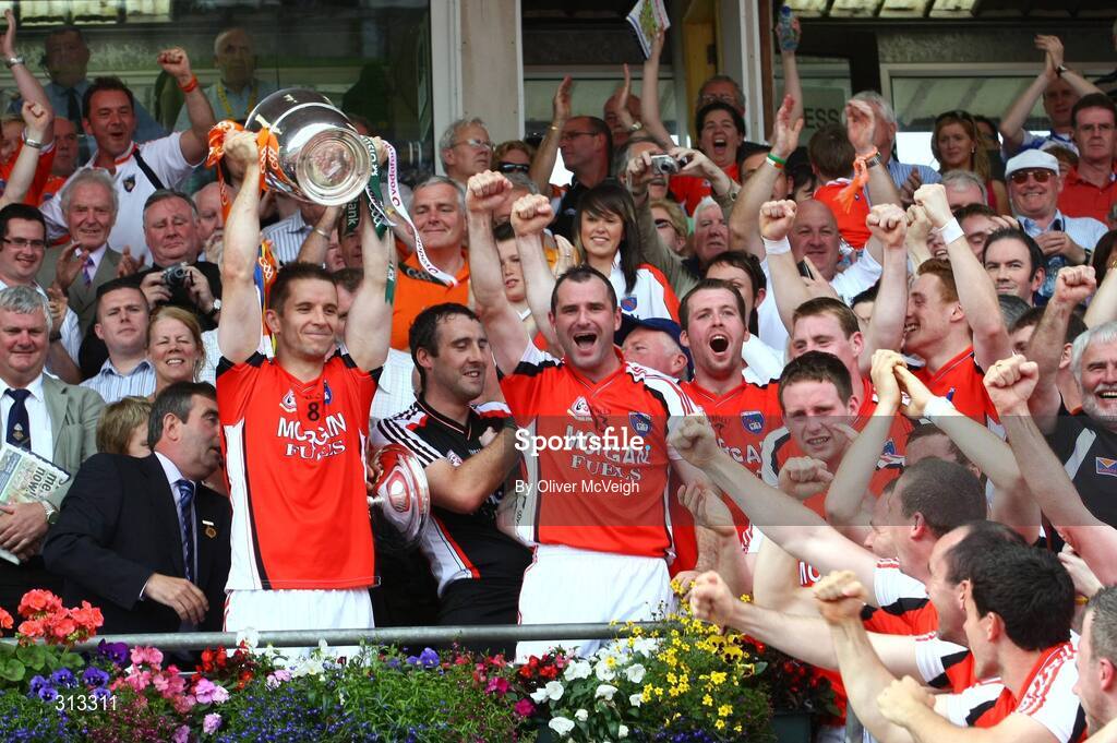 27 July 2008; Armagh captain Paul McGrane lifts the cup alongside his team-mates. GAA Football Ulster Senior Championship Final replay, Armagh v Fermanagh, St Tighearnach's Park, Clones, Co. Monaghan. Picture credit: Oliver McVeigh / SPORTSFILE *** Local Caption *** S0807107 Armagh v Fermanagh OMcV